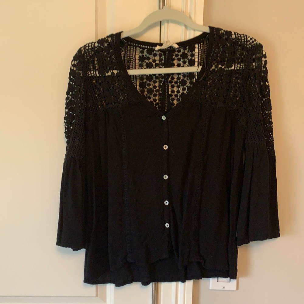 Black blouse barley worn